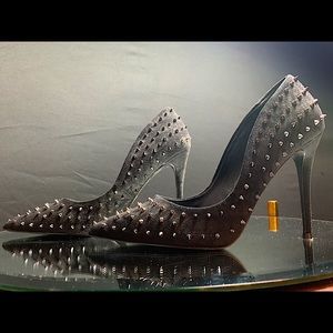 Black Steve Madden heels with metal spikes